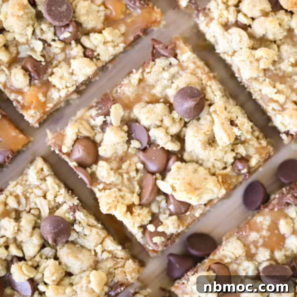 Caramel Peanut Butter Cookie Bars with an oatmeal cookie base, showcasing their delicious layers.