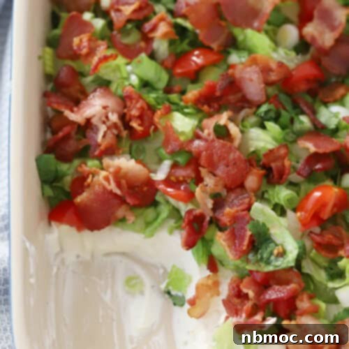 BLT dip with bacon on top, an easy bacon appetizer