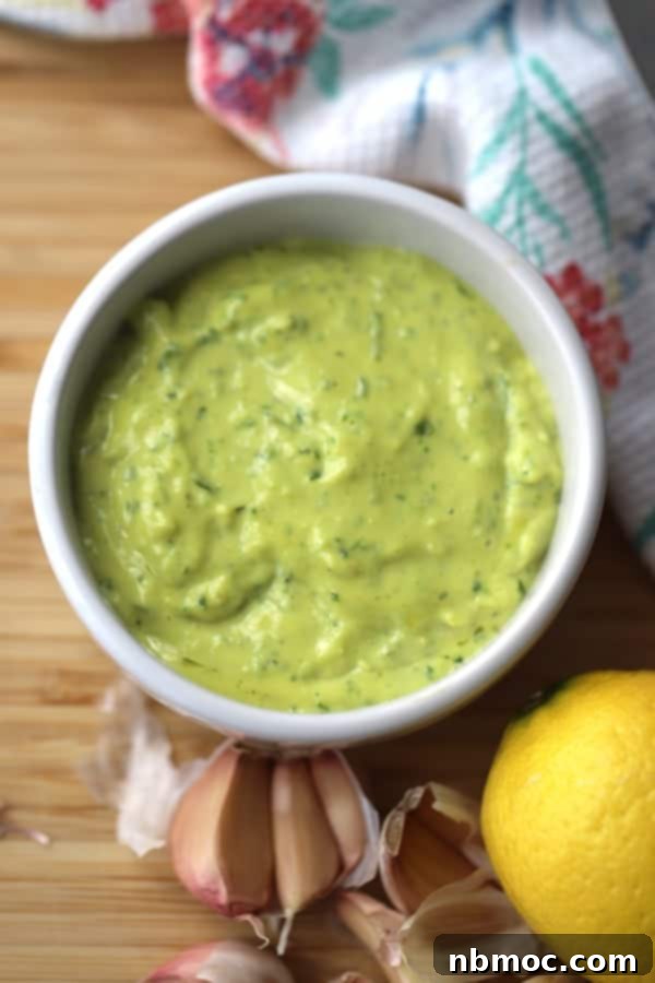 garlic basil hemp aioli in a small white ramekin.