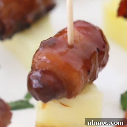 Crispy Bacon Wrapped Smokies 7 bacon wrapped smokies on pineapple