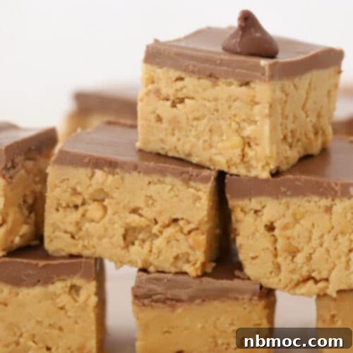 Peanut Butter Dream Bars 4 Homemade peanut butter bars, an easy no-bake recipe, stacked and ready to enjoy.
