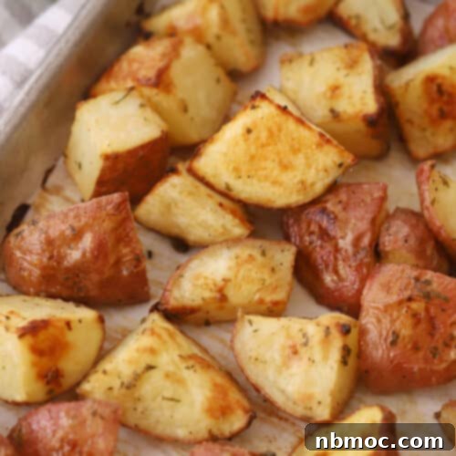 Decadent Garlic Herb Cheesy Potatoes 7 oven roasted red potatoes recipe