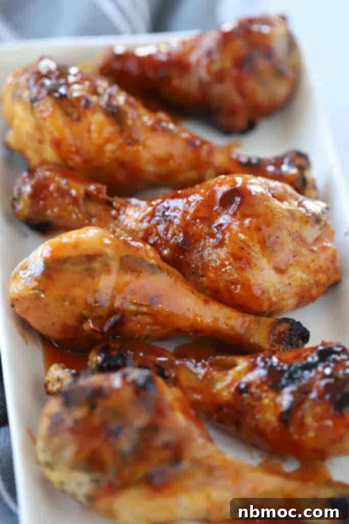 A platter with Buffalo chicken drumsticks, ready to be served.