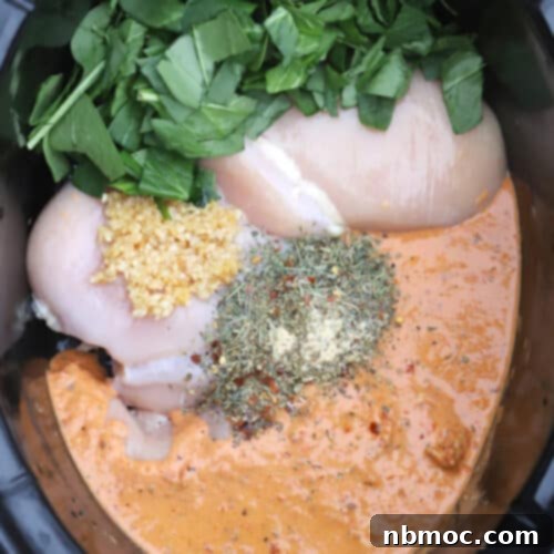 Effortless Creamy Tuscan Slow Cooker Chicken 7 easy slow cooker tuscan chicken ingredients in a crockpot