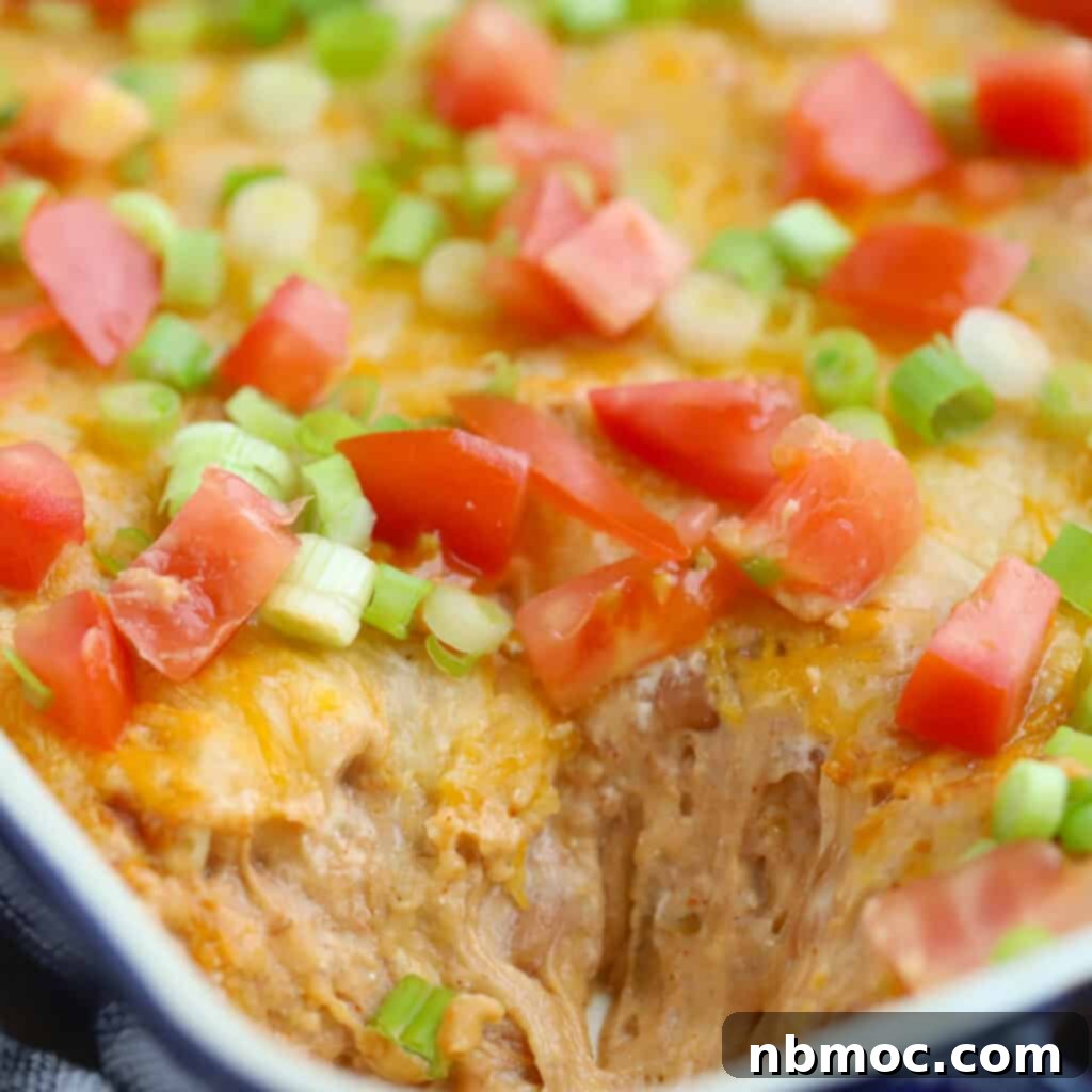 cream cheese bean dip served with tortilla chips.