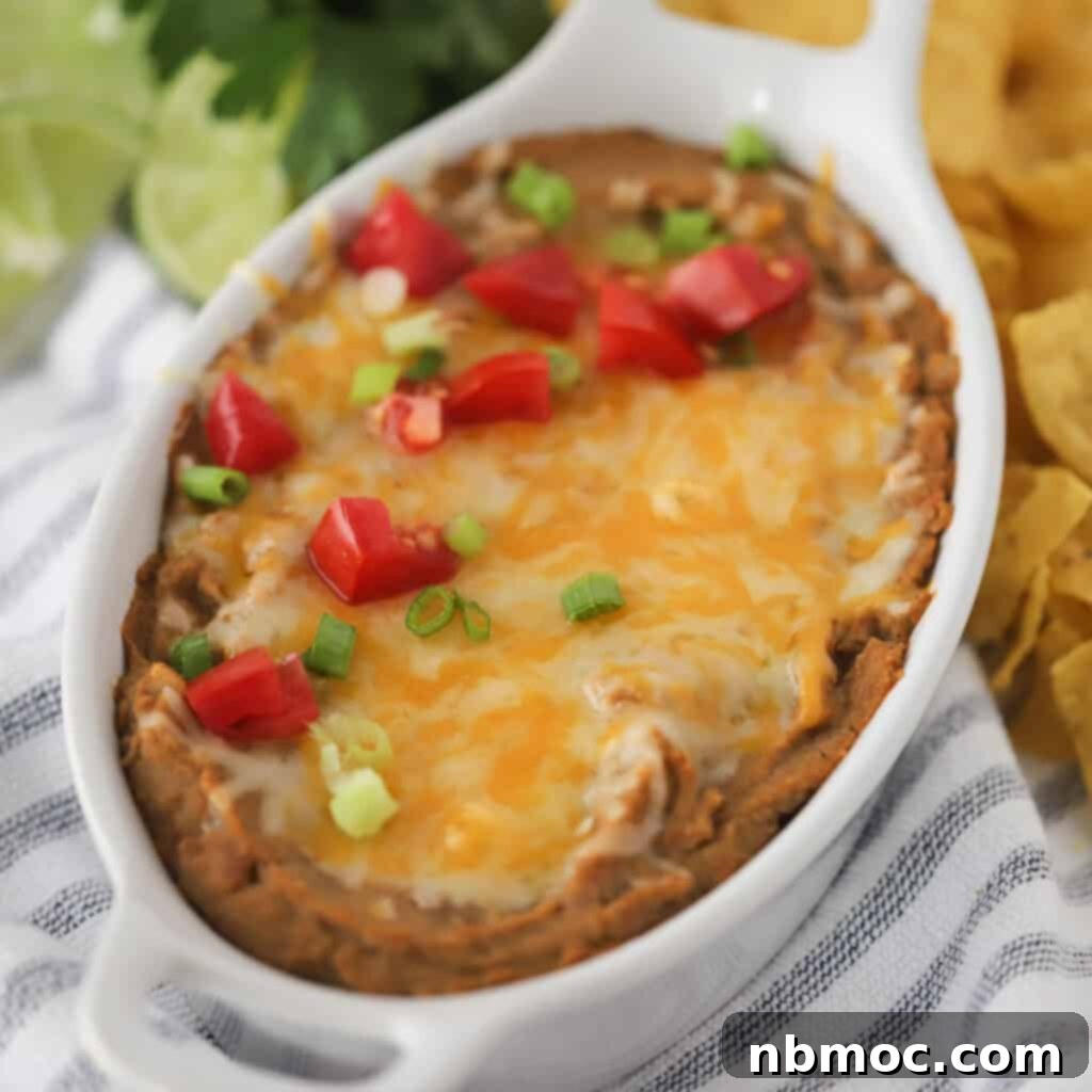 refried beans topped with cheese, one of the best party foods.