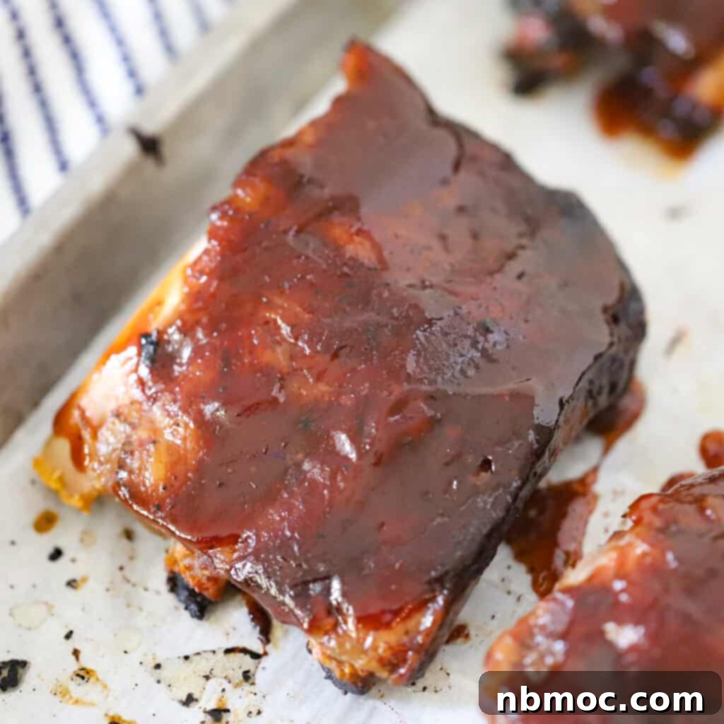 baby back ribs on a sheet tray.