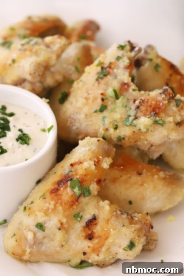 Garlic Parmesan chicken wings on a serving platter.