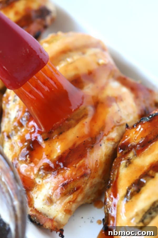 Craft Your Own Buffalo Sauce 3 Easy buffalo sauce made with Frank's Red Hot Sauce and brown sugar being brushed over the top of grilled chicken breasts, ready to be enjoyed.