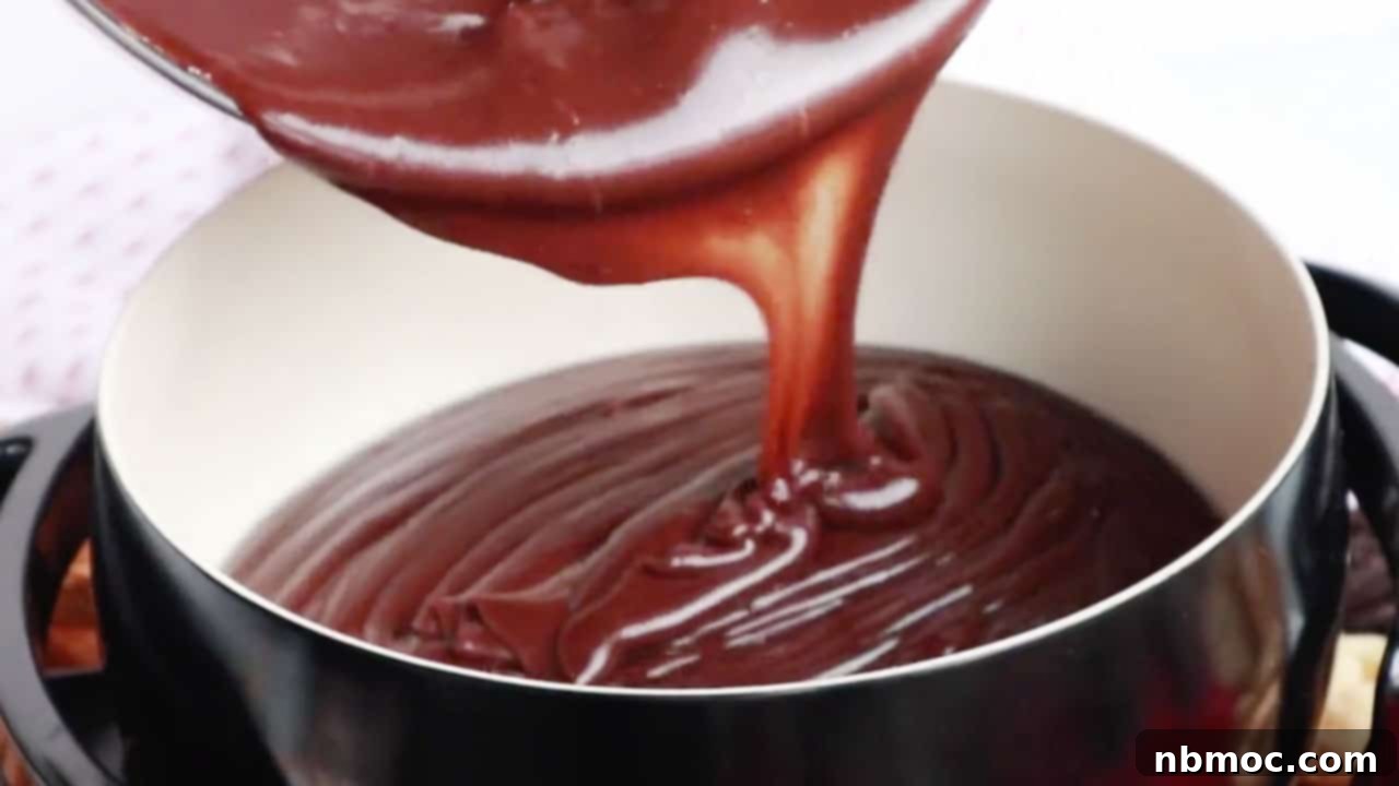 Chocolate Bliss Melt 6 pouring chocolate into fondue pot, chocolate fondue ideas, fondue chocolate. chocolate for fondue, fondue recipe chocolate.
