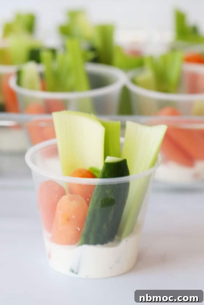 mini veggie cups with ranch dressing in the bottom