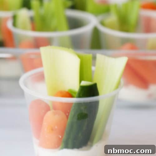 mini veggie cups with ranch dressing in the bottom