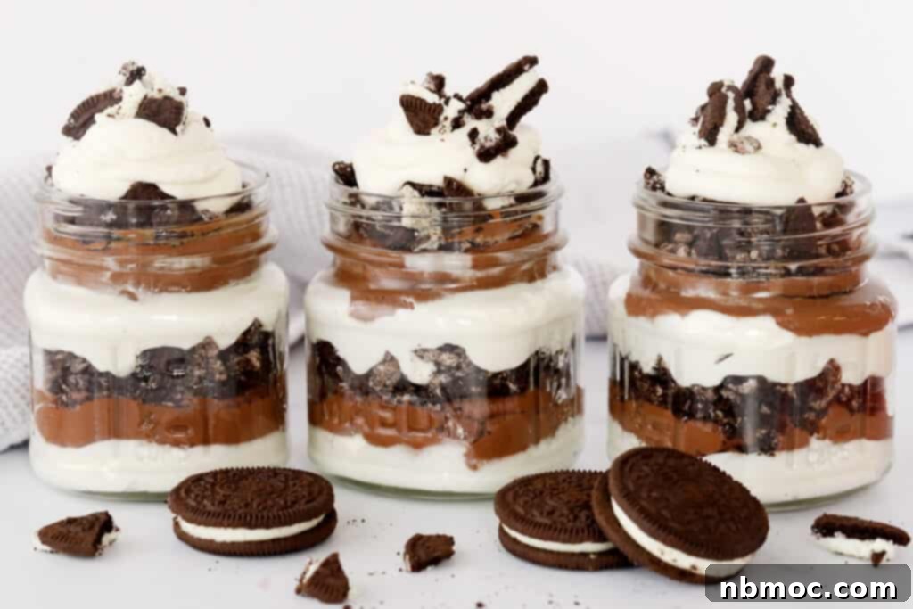 Delicious chocolate parfait with crushed Oreos and fluffy whipped cream topping