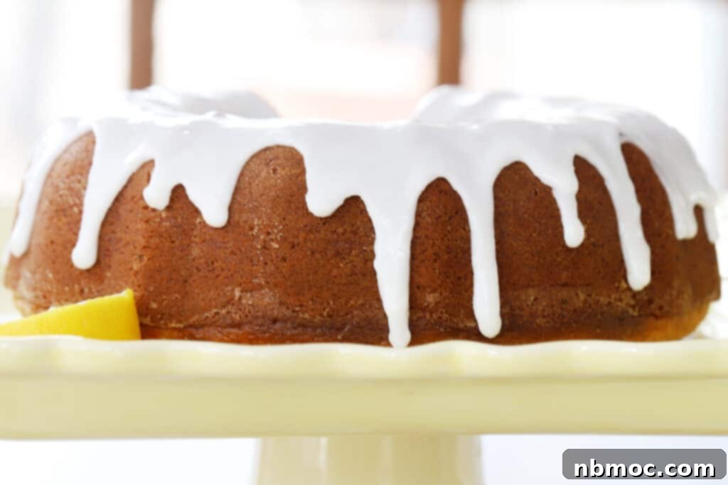 lemon poppy seed bundt cake recipe, lemon poppy seed cake recipe on a yellow platter, poppy seed lemon pound cake; lemon poppy seed cake bundt.