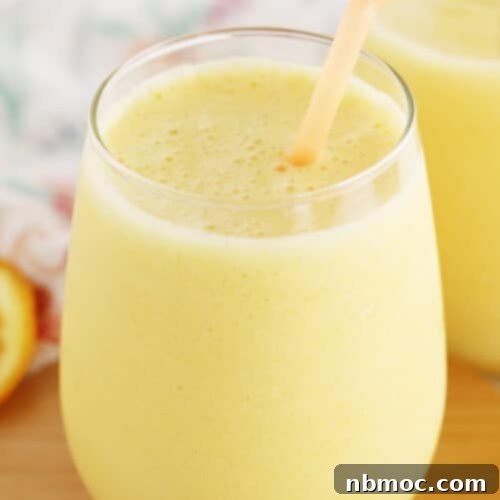 Frothy Orange Dream 6 Orange Julius recipe in a glass cup