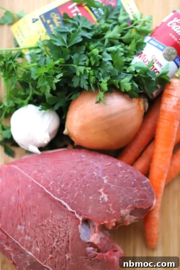 Ingredients needed to make a rump roast in a slow cooker, featuring a cutting board with the best rump roast recipe components for a classic Sunday pot roast.