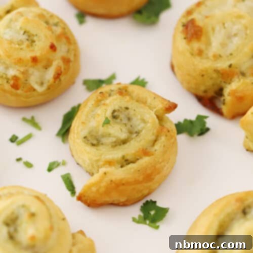Savory Pesto Swirls 5 Easy pesto pinwheel recipe made with Pillsbury crescent rolls