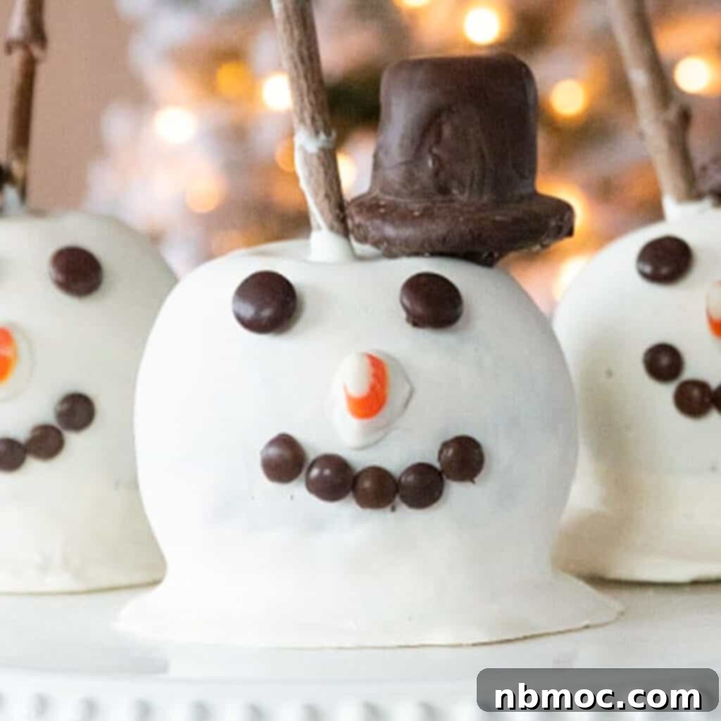 Delightful Snowman Caramel Apples, a festive and charming holiday treat recipe.