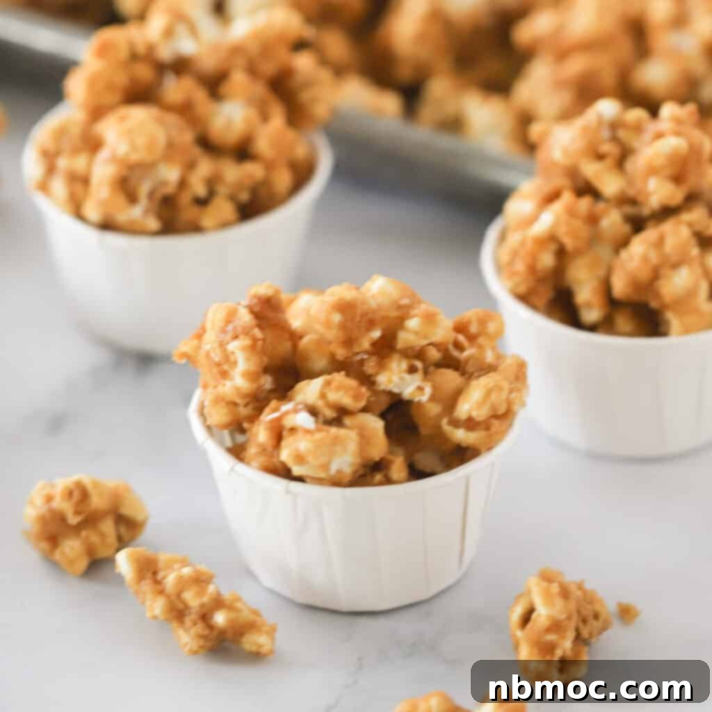 A bowl of Homemade Cracker Jacks, featuring caramel-coated popcorn and peanuts, evoking a sense of nostalgic delight.