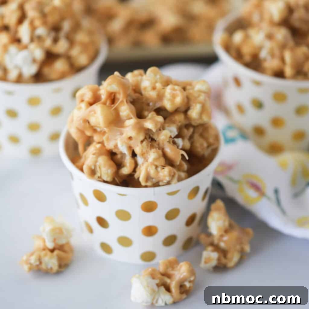 A generous serving of delicious Peanut Butter Popcorn, perfect for a cozy movie night or a sweet treat.