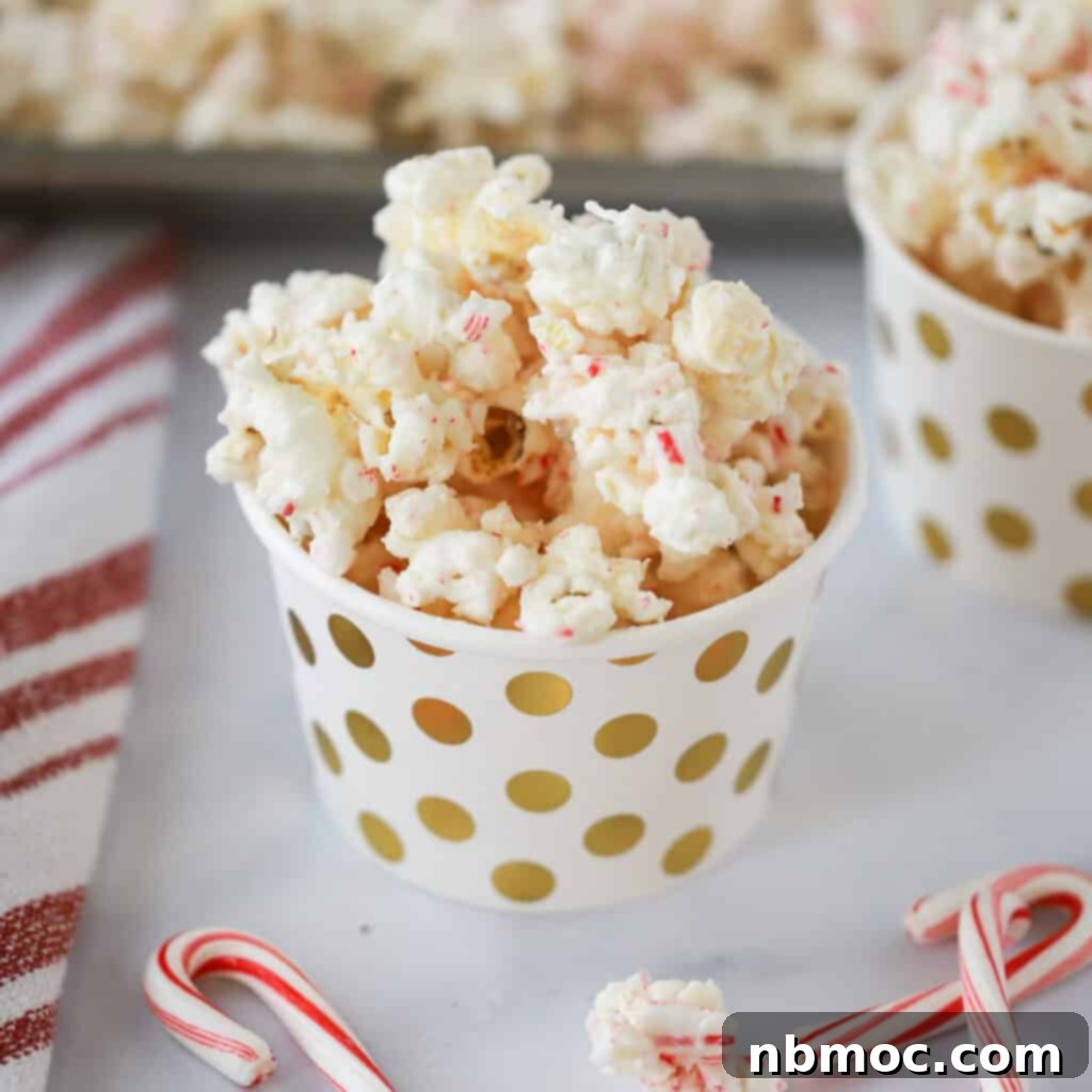 Festive Candy Cane White Chocolate Popcorn, a delightful and easy holiday treat.