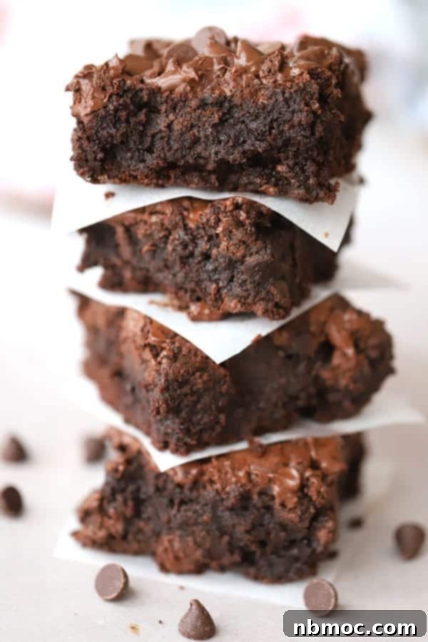 Einkorn brownies stacked on top of each other.