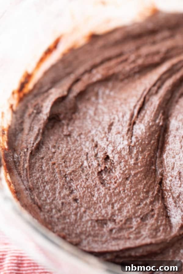 Einkorn Brownies batter in a glass bowl. 