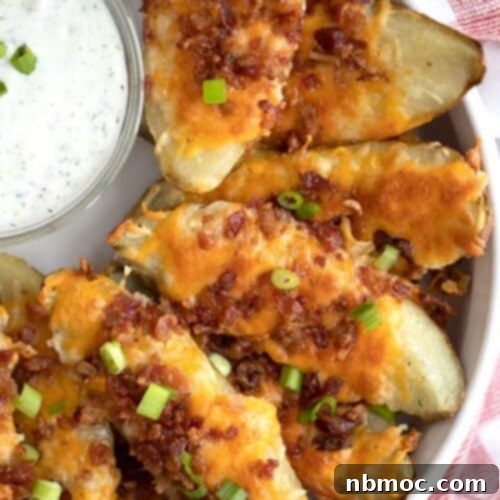 loaded baked potato skins recipe with cheese and bacon, easy baked potato skins recipe
