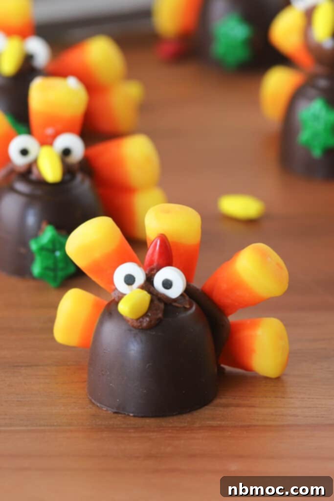 Thanksgiving Candy Turkeys made with bon bons, frosting, candy corns, and candy eyes.