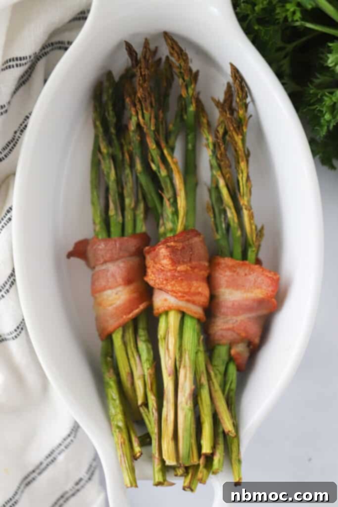 Crispy Bacon Asparagus Bundles 2 How to make bacon wrapped asparagus recipe, easy vegetable side dish, bacon recipe