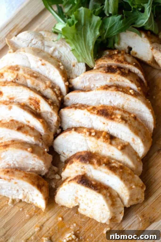 Perfectly baked golden-brown chicken breast in an oven dish