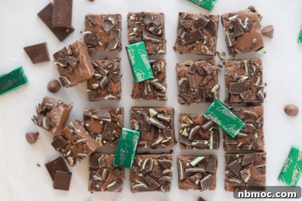 Squares of this mint chocolate fudge recipe topped with crushed Andes mints.