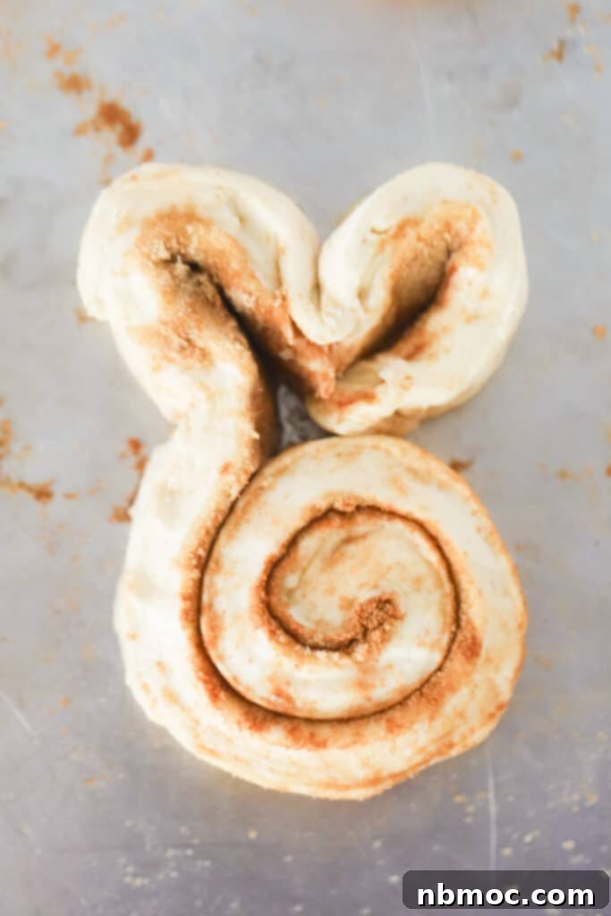 Whimsical Bunny Buns 3 A bunny cinnamon roll shaped and ready to bake. cinnamon bunnies, cinnamon rolls bunny. easter bunny bread rolls.