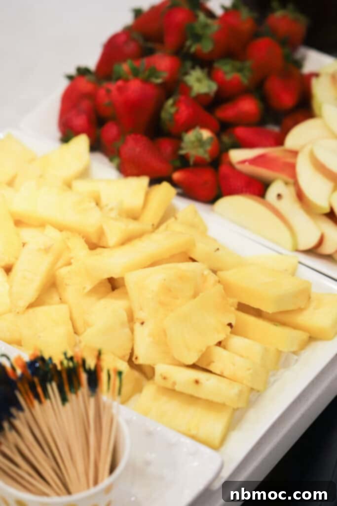 Decadent Chocolate Cascade 4 Fresh fruit cut up for dipping into melted chocolate.