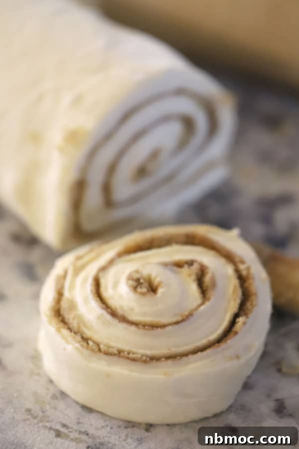 Homemade cinnamon rolls being cut, and ready to bake. Christmas cinnamon rolls, cinnamon roll Christmas trees. 