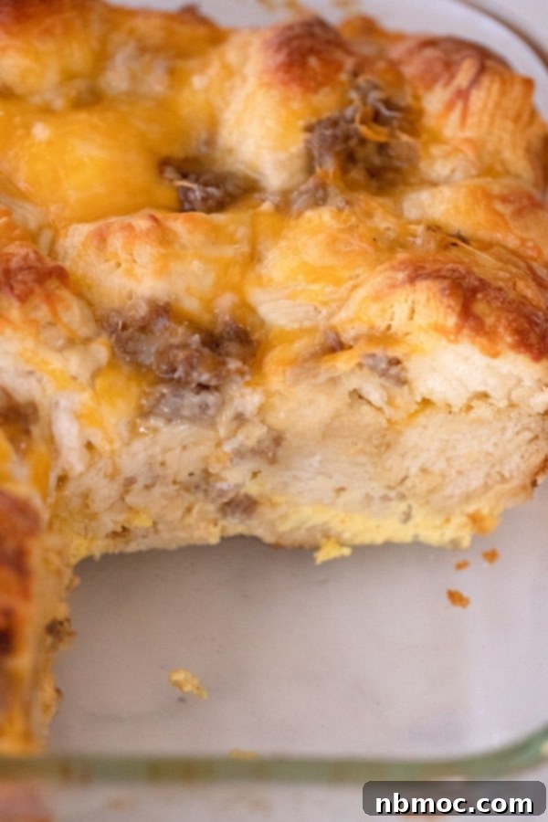 A comforting sausage and egg biscuit casserole, baked to perfection, a top choice for brunch menu ideas for a crowd.