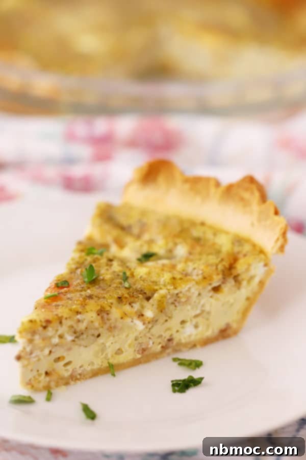A slice of cheese and pesto quiche, showcasing its vibrant flavors, one of the best brunch recipes for cheese lovers.