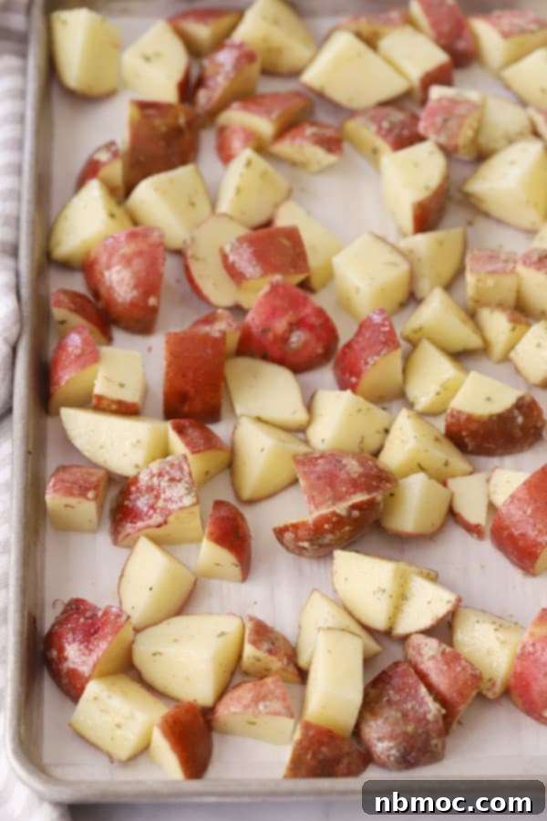 Crispy oven-roasted ranch potatoes, a savory and cheesy potato recipe perfect for brunch menus.