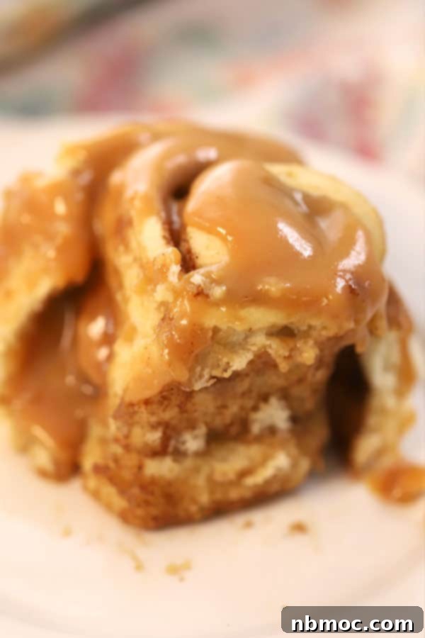 Gooey caramel cinnamon rolls, dripping with luscious caramel sauce, a perfect sweet treat for brunch.