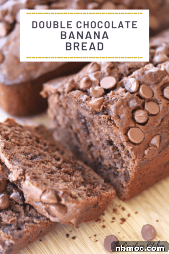 A slice of rich double chocolate banana bread, studded with chocolate chips, a perfect sweet treat.