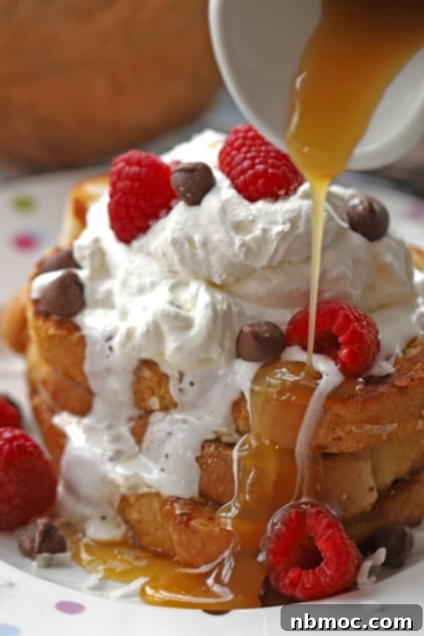 A dish of coconut French toast with a side of homemade coconut syrup, a dream come true for coconut lovers.