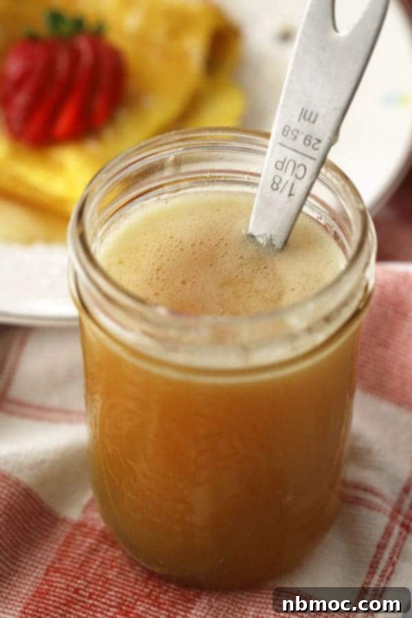 A jar of the best buttermilk syrup recipe, rich and creamy, perfect for a special breakfast.