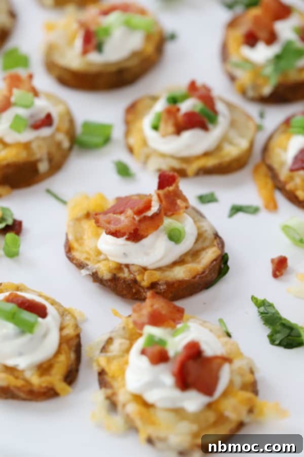 Golden potato round appetizers, loaded with toppings, perfect for a party or brunch.