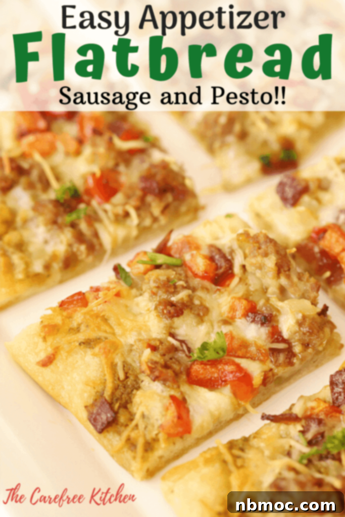 A vibrant pesto and sausage homemade flatbread, loaded with toppings, perfect as a party appetizer.