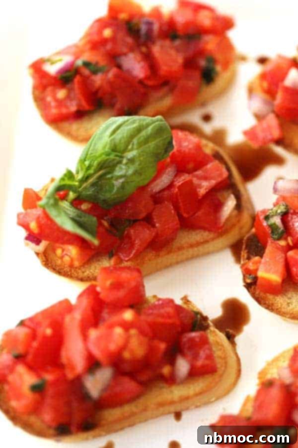 Best bruschetta recipe with fresh tomatoes and basil on toasted bread, a light and healthy appetizer.