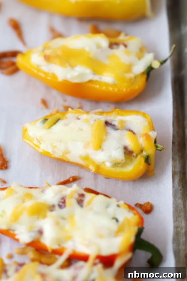 Cream cheese stuffed peppers with bacon and jalapeno, an easy appetizer or brunch idea.