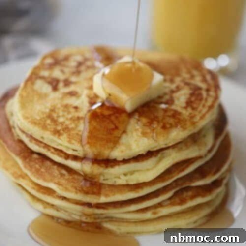 einkorn buttermilk pancakes with butter and syrup