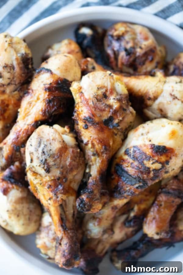 Best grilled chicken drumsticks with garlic and herb marinade, making juicy and flavorful chicken.
