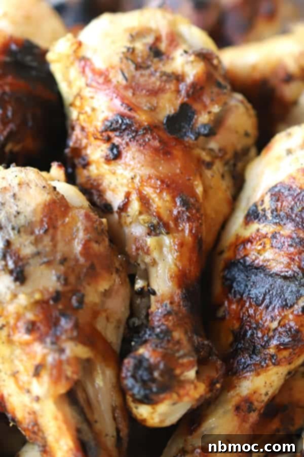 Chicken drumstick marinade for grilling with herbs and garlic, ready to cook for a healthy meal.