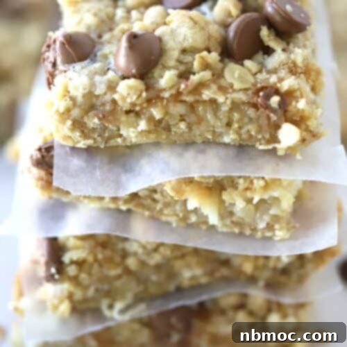 Coconut Caramel Magic Bars stacked on top of each other